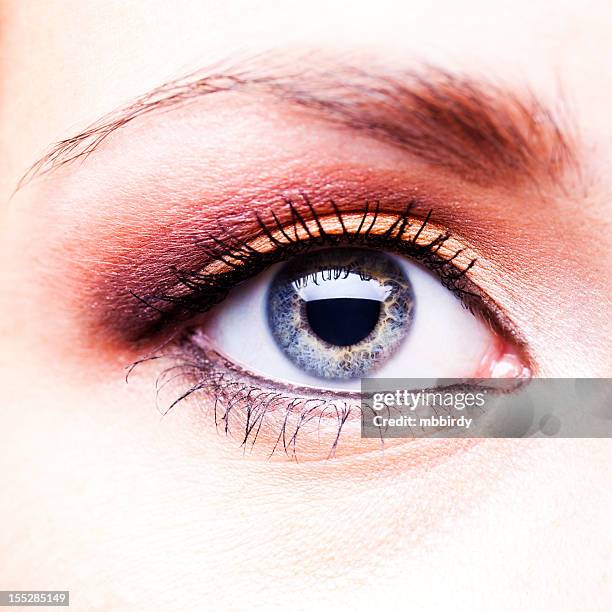 close up of teenage girl' s blue eye - eyelid stock pictures, royalty-free photos & images