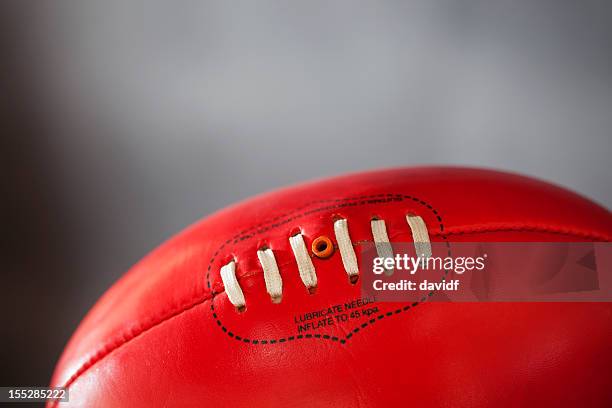 australian rules football afl ball - football australien stock pictures, royalty-free photos & images