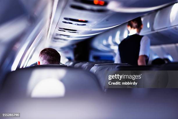 flying with airplane - business class seat stockfoto's en -beelden