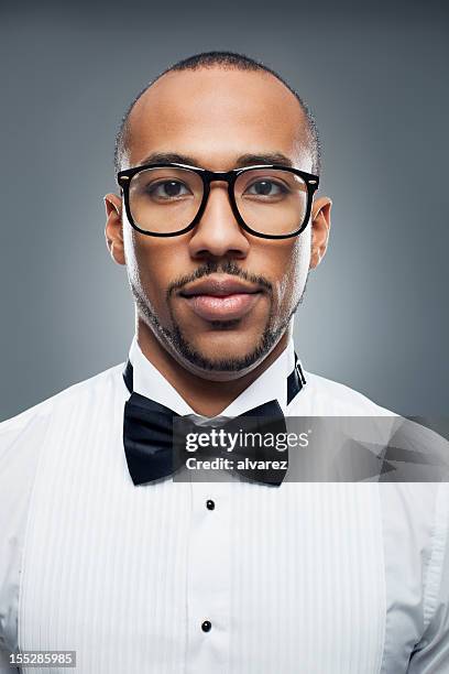 young man with a  bow tie - man goatee stock pictures, royalty-free photos & images