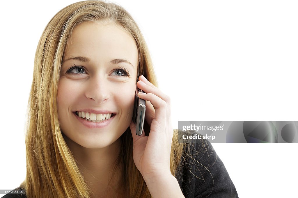 Pretty teen girl talking on mobile phone