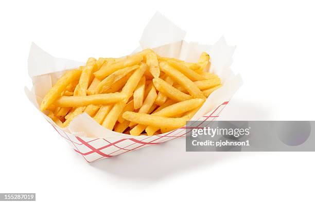 fries in a cardboard tray on a white background - french fries stock pictures, royalty-free photos & images