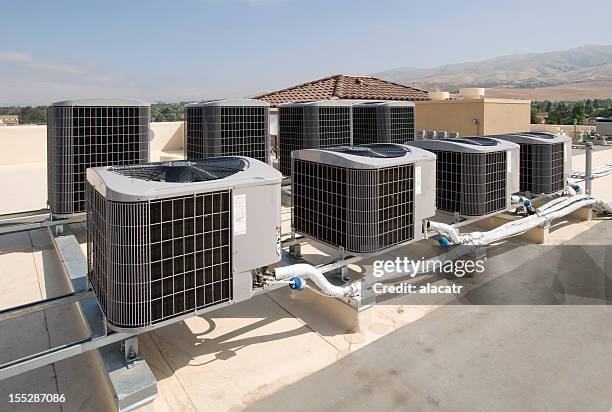 rooftop air conditioning units - rooftop hvac stock pictures, royalty-free photos & images