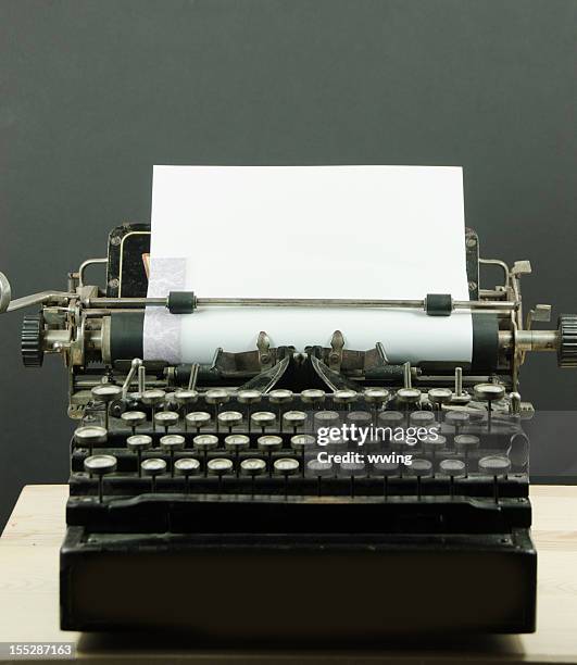vintage typewriter with copy space - blank typing paper stock pictures, royalty-free photos & images