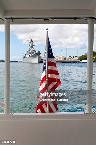 u.s. navy and american flag in pearl harbor hawaii - independence missouri stock pictures, royalty-free photos & images