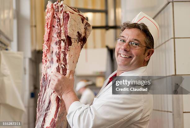 butcher with meat - slaktare bildbanksfoton och bilder