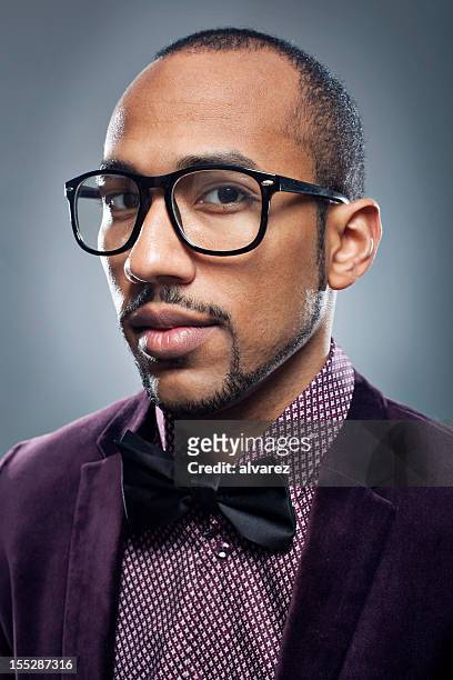 young man with a  bow tie - man goatee stock pictures, royalty-free photos & images
