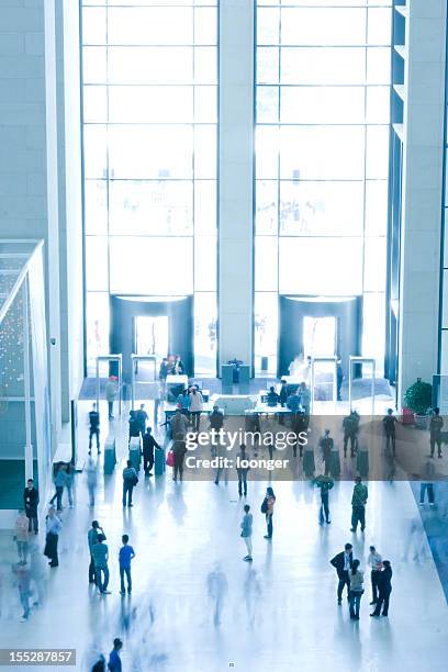 crowd in the bright hall - museum entrance stock pictures, royalty-free photos & images