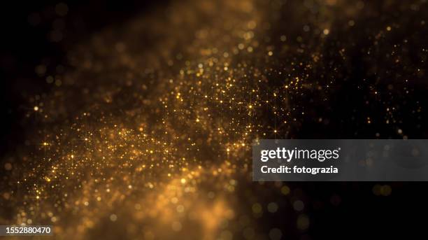 blurred golden particles with copy space - lightweight stock pictures, royalty-free photos & images