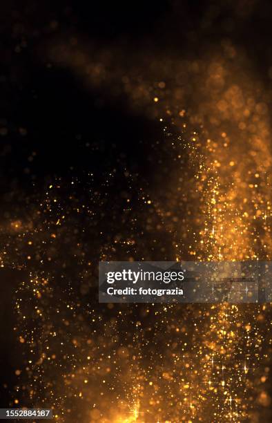 golden particles with copy space - gold medal stock pictures, royalty-free photos & images