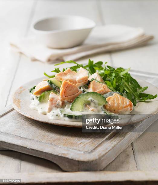 plate of poached salmon with salad - dill stock pictures, royalty-free photos & images