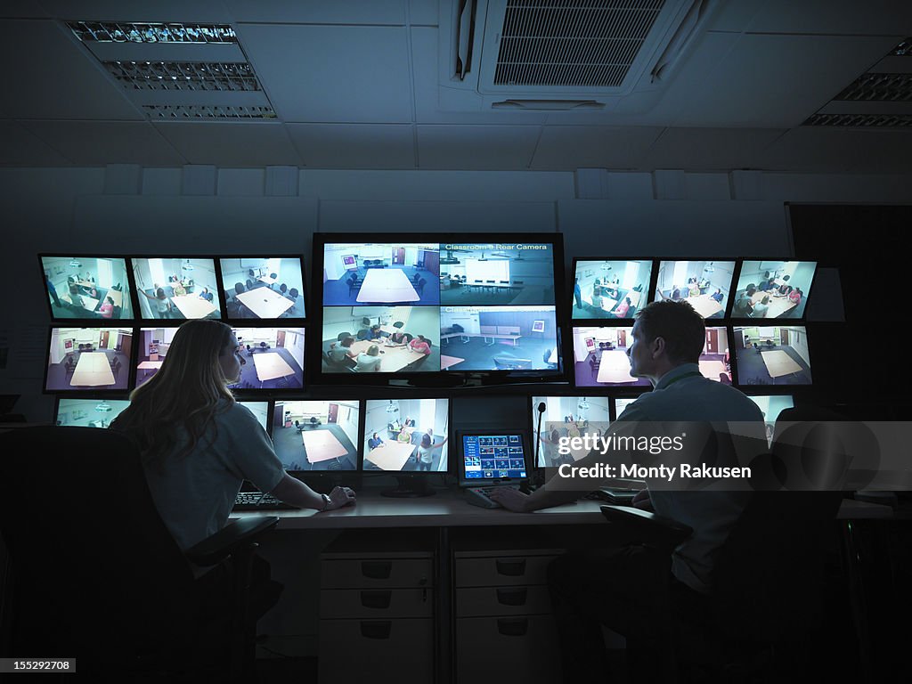 Students watching screens in forensics training facility