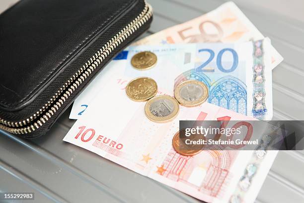 wallet with euro notes and coins - wallet money stock-fotos und bilder