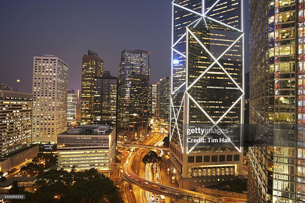 Urban skyscrapers lit up at night