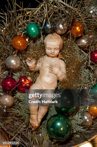 Baby Jesus figurine and other Christmas decorations Baby Jesus figurine and other Christmas decorations