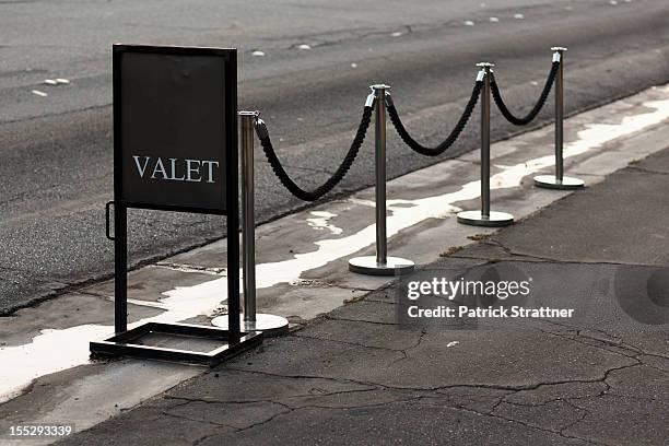 sign and stanchions for valet parking - roped off stock pictures, royalty-free photos & images