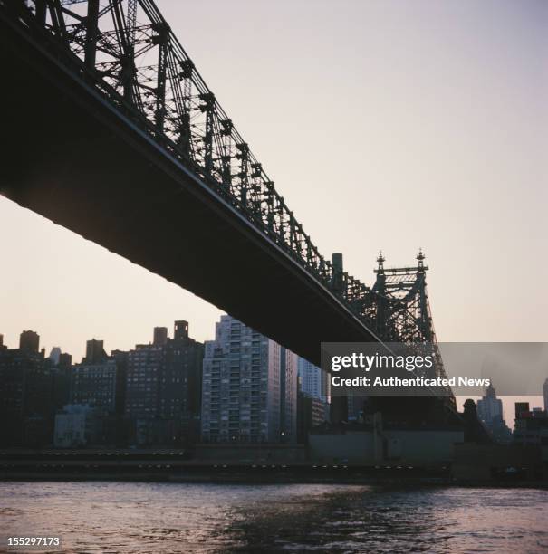 The Ed Koch Queensboro Bridge, also known as the Queensboro Bridge or 59th Street Bridge, over the East River in New York City, circa 1960.