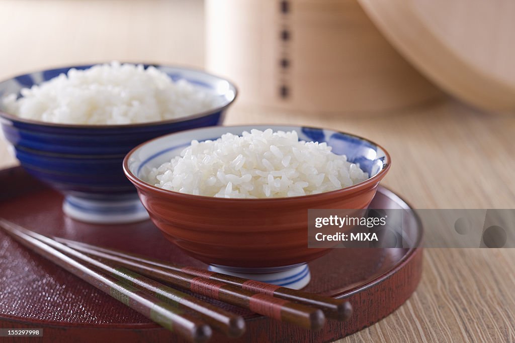 Steamed Rice in Rice Bowls and Wooden Tub