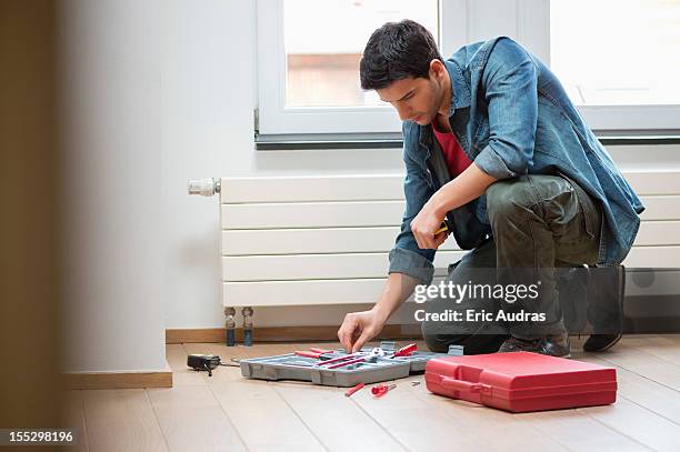 technician arranging his toolbox - adult man brussels stock pictures, royalty-free photos & images