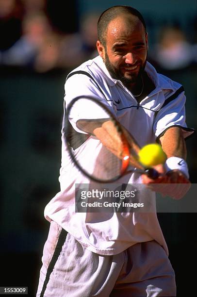 Andre Agassi of the United States in action during the 1999 French Open Final match against Andrei Medvedev of the Ukraine played at Roland Garros in...