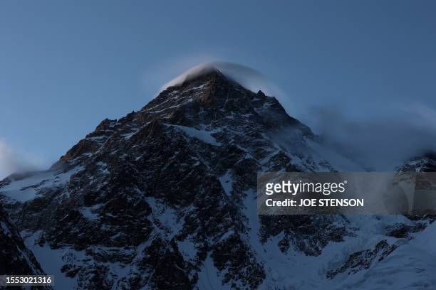 This picture taken on July 15, 2023 shows a view of K2, world's second tallest mountain from its Base camp in the Karakoram range of GilgitBaltistan,...