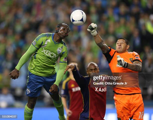 Goalkeeper Nick Rimando of Real Salt Lake punches away a shot by Jhon Kennedy Hurtado of the Seattle Sounders FC at CenturyLink Field on November 2,...