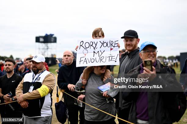 Young fan shows support for Rory McIlroy of Northern Ireland during a practice round prior to The 151st Open at Royal Liverpool Golf Club on July 18,...