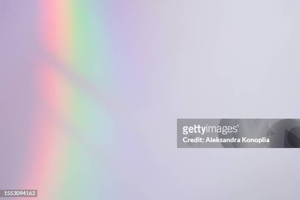 blurred spectrum rainbow light refraction texture overlay effect - rainbow light reflection ストックフォトと画像