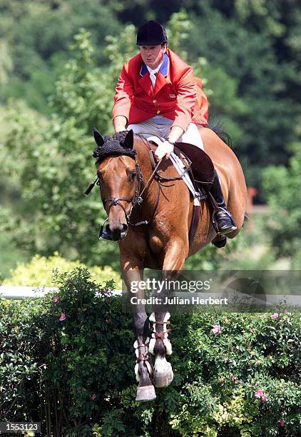 Peter Leone of The U.S.A. Clears the first fence in the The Traxdata Sussex Stakes at The Traxdata Royal International Horse Show held at Hickstead....