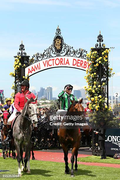 Craig Williams celebrates on Alcopop after winning the Longines Mackinnon Stakes during AAMI Victoria Derby Day at Flemington Racecourse on November...