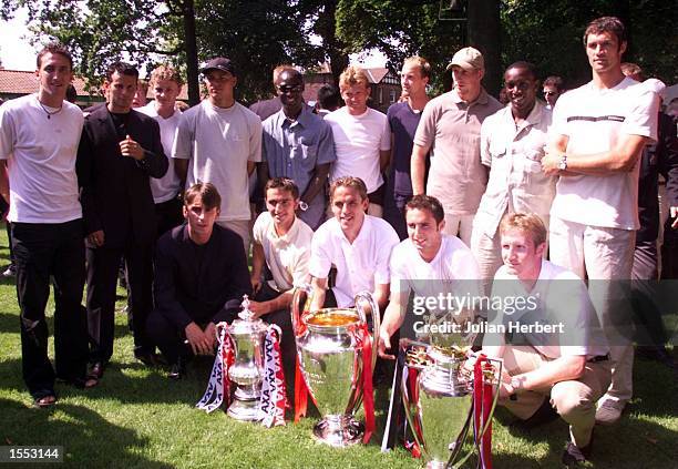 Mancheter United players parade the three Trophies at Haydock Park on The Alex Ferguson Testimonial Race Day held in honour of The Manchester United...