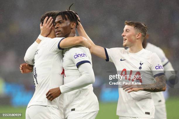 Destiny Udogie of Hotspur celebrates a goal with Ivan Perisic during the pre-season friendly match between Tottenham Hotspur and West Ham United at...