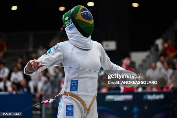 Brazil's Nathalie Moellhausen competes against Switzerland's Angela Krieger during their Epee Women's Senior Individual qualifier as part of the FIE...