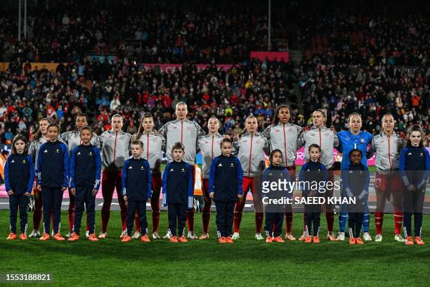 Switzerland's players sing their national anthem prior to the Australia and New Zealand 2023 Women's World Cup Group A football match between...
