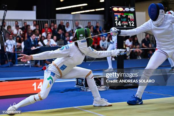 Brazil's Nathalie Moellhausen competes against Switzerland's Angela Krieger during their Epee Women's Senior Individual qualifier as part of the FIE...