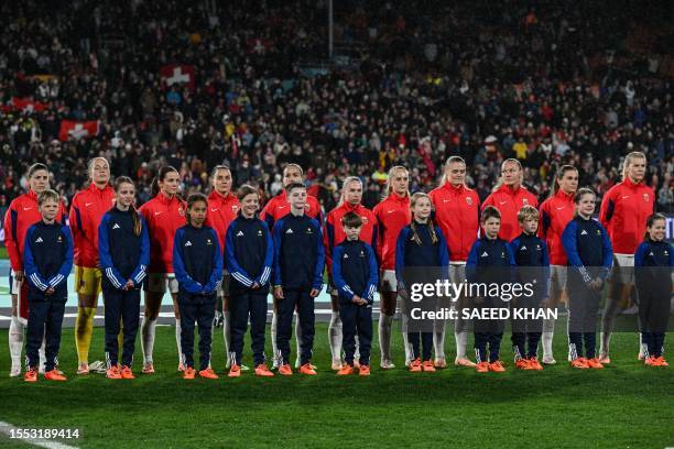 Norway's players listen to national anthem prior to the Australia and New Zealand 2023 Women's World Cup Group A football match between Switzerland...