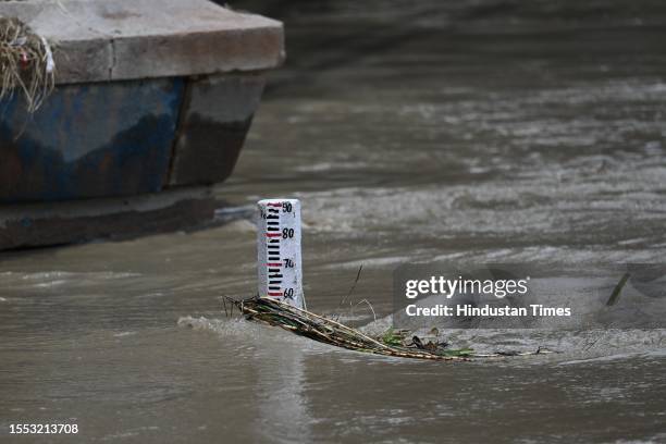 General view of rising water level of river Yamuna after heavy monsoon rains at Old Iron Bridge on July 24, 2023 in New Delhi, India.