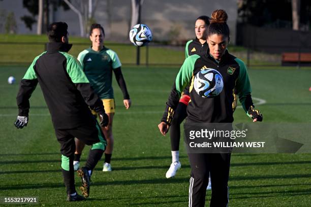 Jamaica's Kameron Simmonds watches the ball during a training session in Melbourne on July 25 ahead of the Women's World Cup football match between...