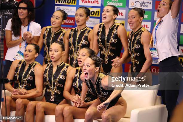 Members of Team United States react after winning bronze in the Artistic Swimming Team Technical Final on day five of the Fukuoka 2023 World Aquatics...