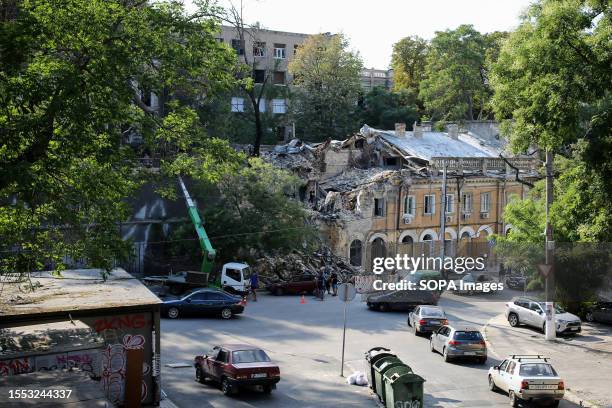 Worker cleans up the destruction caused by a rocket attack at Military Descent a day after the rocket attack in Odessa. According to the Operational...