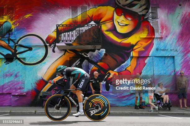 Marco Haller of Austria and Team BORA-Hansgrohe sprints during the stage sixteen of the 110th Tour de France 2023 a 22.4km individual climbing time...