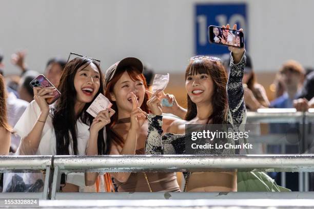 Racegoers at Sha Tin Racecourse on July 3, 2023 in Hong Kong.