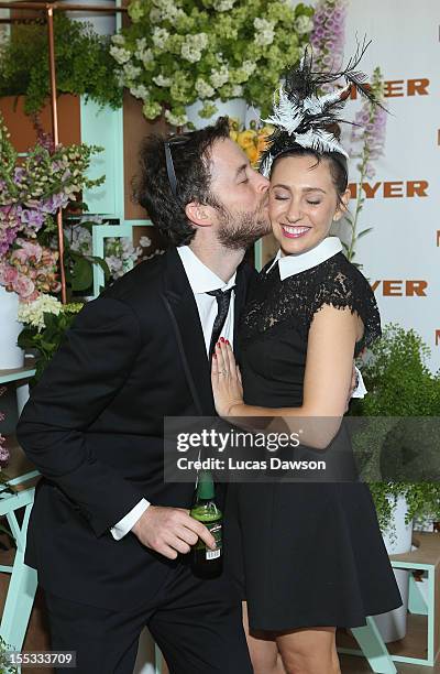 Hamish Blake and Zoe Foster attend the Myer marquee on Derby Day at Flemington Racecourse on November 3, 2012 in Melbourne, Australia.