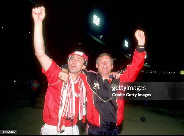 Bryan Robson of Manchester United and Manager Alex Ferguson celebrate after their victory in the FA Cup Final against Crystal Palace at Wembley...