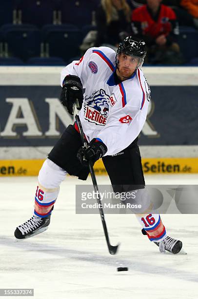 Eric Chouinard of Nuernberg skates up the ice against the Hannover Scorpions during the DEL match between Hannover Scorpions and Thomas Sabo Ice...