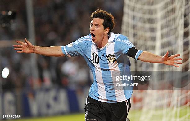 Argentine forward Lionel Messi celebrates after scoring against Uruguay during their Brazil 2014 FIFA World Cup South American qualifier football...