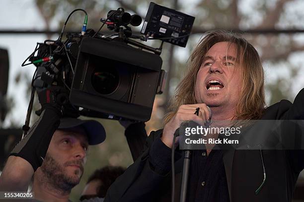 Actor Val Kilmer acts on stage while filming the new Terrence Malick movie during day one of Fun Fun Fun Fest at Auditorium Shores on November 2,...