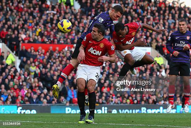 Patrice Evra of Manchester United scores his team's second goal during the Barclays Premier League match between Manchester United and Arsenal at Old...