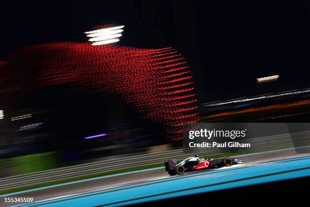 Lewis Hamilton of Great Britain and McLaren drives on his way to finishing first during qualifying for the Abu Dhabi Formula One Grand Prix at the...