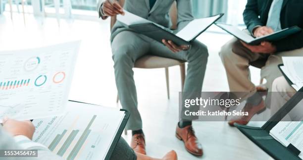 closeup, business people and team in a meeting, paperwork and discussion with budget planning, profit growth and cooperation. group, staff and documents with financial feedback, charts and graphs - corporate business transaction stock pictures, royalty-free photos & images